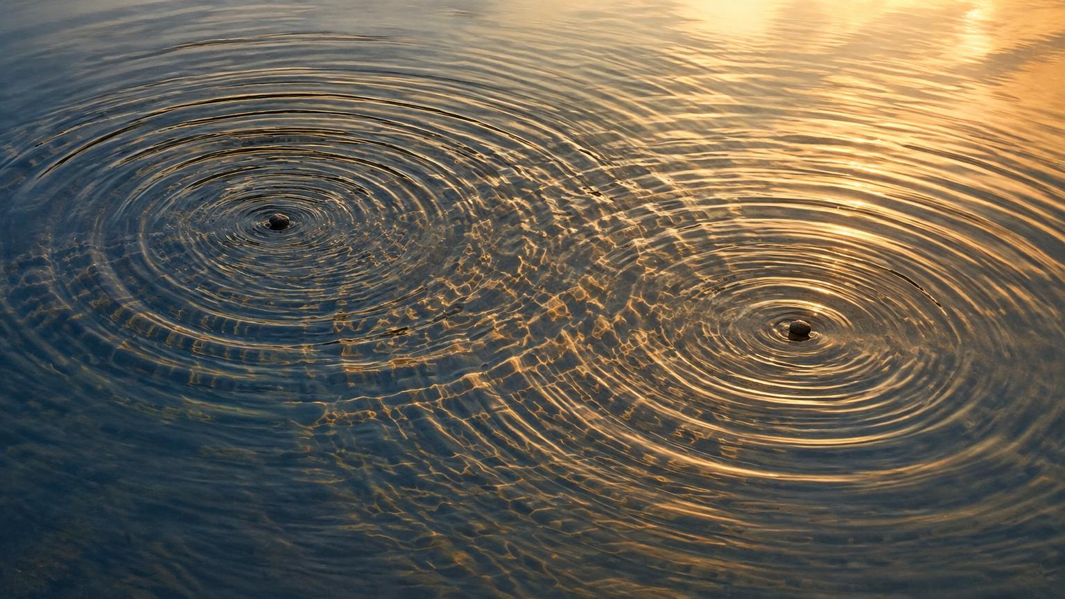 Ondas de duas pedras em um lago se cruzando